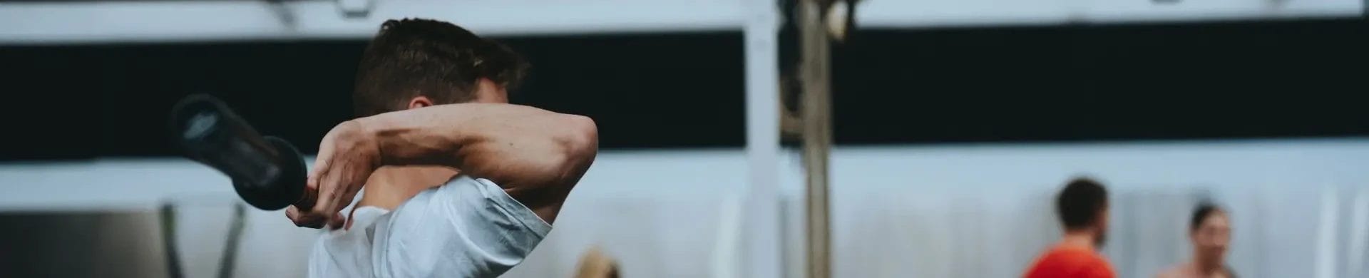 man exercising at the gym